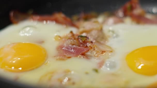 Eggs Bacon Sizzling Skillet Stove Selective Focus — Stock Video