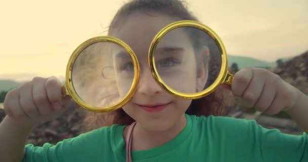 Portrait Happy Smiling Funny Child Looking Camera Playing Magnifying Glass — Stock Video