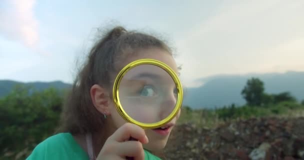 Portrait Happy Smiling Funny Child Looking Camera Playing Magnifying Glass — Stock Video