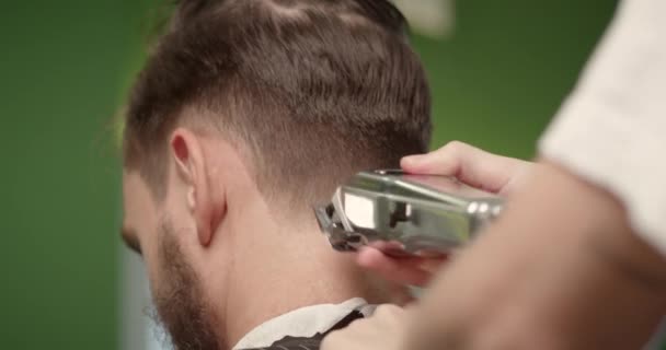 Hairdresser Makes Hairstyle Hair Comb Hair Machine — Stock Video