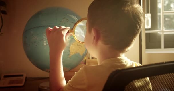 Kid Morning Light Sunset Cute Little Boy Looking Globe Magnifying — Stock Video