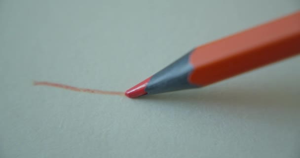 Matita Colore Arancione Grafite Disegna Una Linea Retta Una Carta — Video Stock
