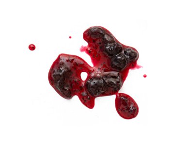 Abstract liquid stain of sweet black currant jam or sauce isolated on white, top view