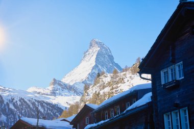 Snowy Matterhorn Peak on a Sunny Day Seen from Zermatt, Switzerland  Iconic Alpine Landscape clipart