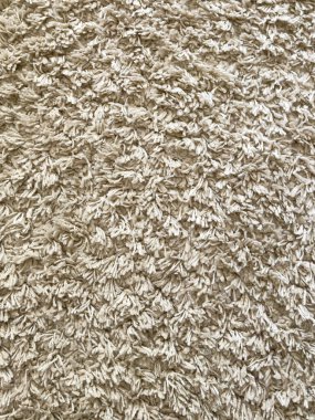 Bej renkli tüy yığını halı dokusu