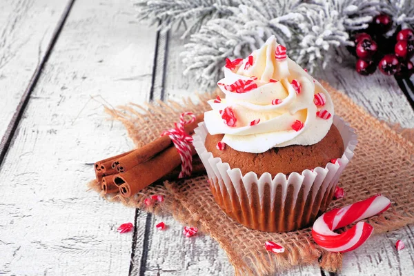 Christmas Candy Cane Cupcake Creamy Frosting Close Snowy Branches Rustic — Stock Photo, Image