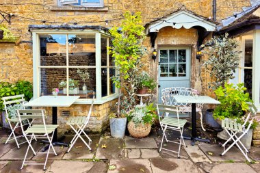 Quaint cafe in the beautiful Cotswolds of England clipart