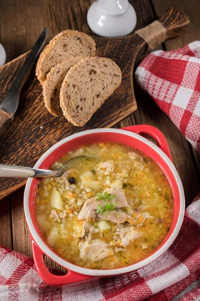 Polish barley soup with vegetables and chicken - krupnik.