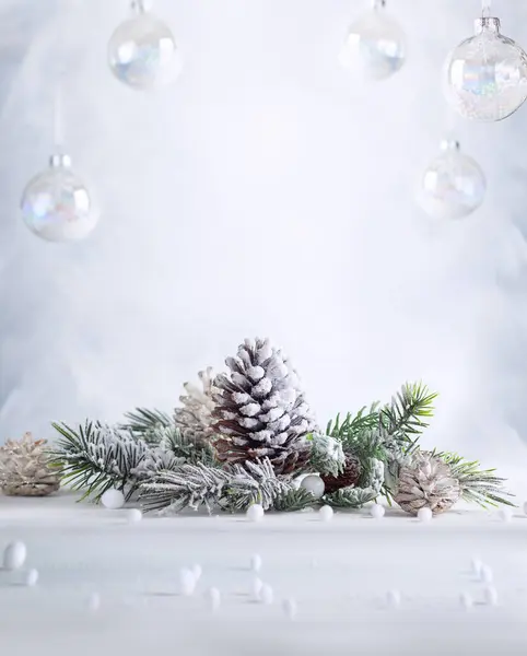 Christmas Still Life Snowy Pine Cones Baubles Fir Branches Light Stock Photo