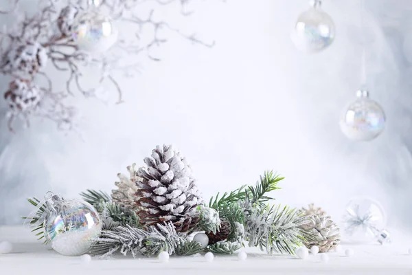Christmas Still Life Snowy Pine Cones Baubles Fir Branches Light Royalty Free Stock Photos