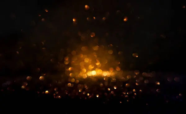 Meleg Arany Bokeh Fények Megvilágítják Sötét Hátteret Létrehozva Egy Absztrakt Stock Kép
