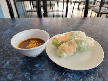 shrimp and vegetables Vietnamese summer or fresh rolls with peanut sauce