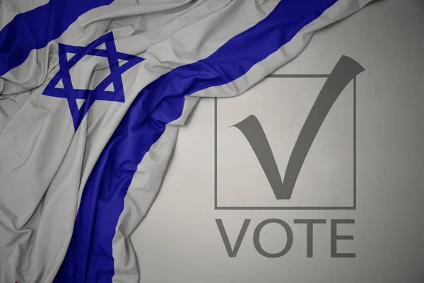 Махаючи Барвистим Національним Прапором Ізраїлю Сірому Фоні Текстовим Голосуванням Концепція — стокове фото