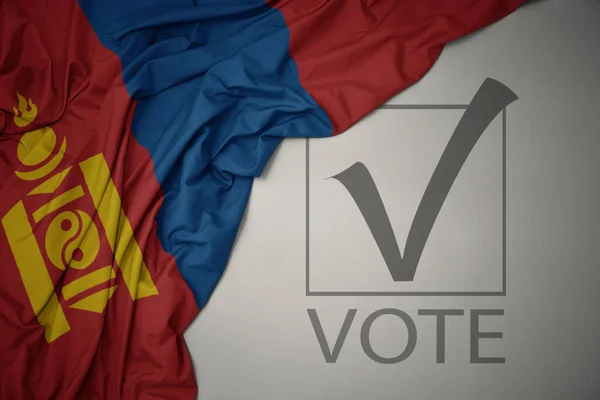 Κυματίζει Πολύχρωμη Εθνική Σημαία Της Μογγολίας Γκρι Φόντο Ψηφοφορία Κειμένου — Φωτογραφία Αρχείου