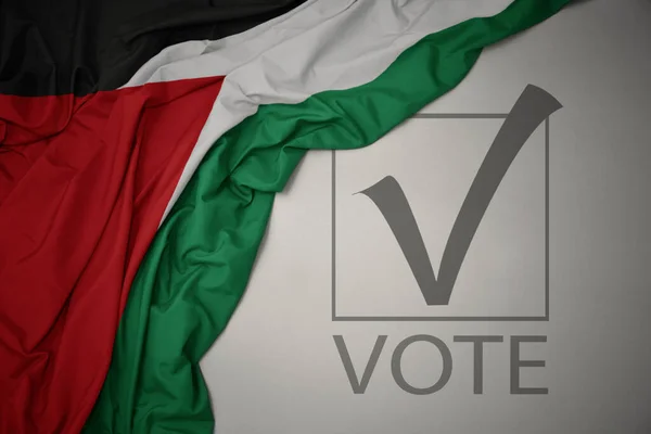 Machanie Kolorową Flagą Narodową Palestyny Szarym Tle Głosowaniem Tekstowym Koncepcja — Zdjęcie stockowe