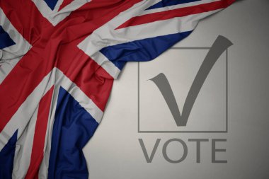 Büyük Britanya 'nın renkli bayrağını gri bir arkaplanda metin oyuyla sallıyordu. Seçim konsepti. 3B illüstrasyon