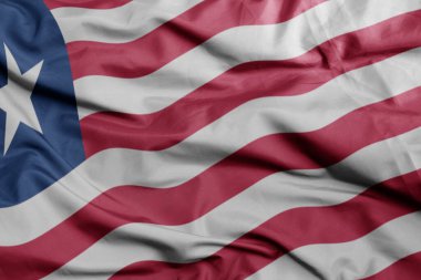 Liberya 'nın renkli ulusal bayrağını sallıyor. Makro atış. 3B illüstrasyon