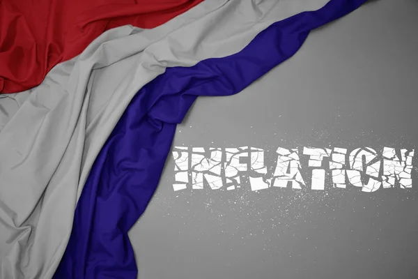 Waving Colorful National Flag Netherlands Gray Background Broken Text Inflation — Stock Photo, Image