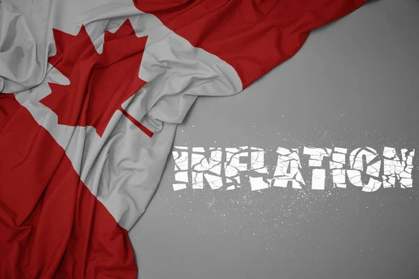 Machanie Barwną Flagą Narodową Kanady Szarym Tle Zepsutą Inflacją Tekstową — Zdjęcie stockowe