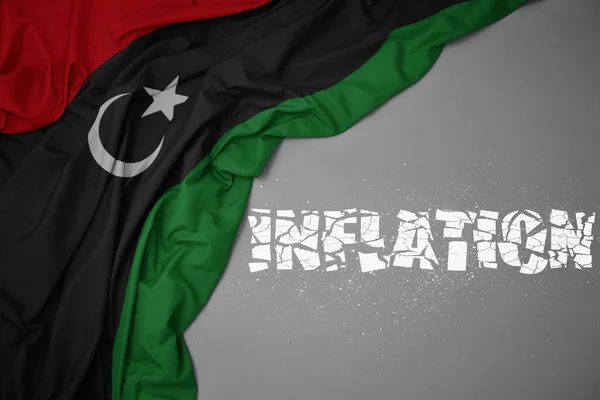Waving Colorful National Flag Libya Gray Background Broken Text Inflation — Stock Photo, Image