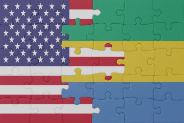 Gabon 'un ulusal bayrağı ve Amerika Birleşik Devletleri' nin bulmacası. Makro. konsept. 3d illüstrasyon