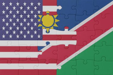 Namibya bayrağı ve Amerika Birleşik Devletleri 'nin bulmacası. Makro. konsept. 3d illüstrasyon