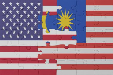 Ulusal Malezya bayrağı ve Amerika Birleşik Devletleri bulmacası. Makro. Kavram. 3d illüstrasyon