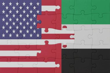 Birleşik Arap Emirlikleri 'nin ve Amerika Birleşik Devletleri' nin ulusal bayrağının bulmacası. Makro. Kavram. 3d illüstrasyon