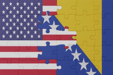 Bosna ve Herzegovina 'nın ulusal bayrağı ve Amerika Birleşik Devletleri' nin bulmacası. Makro. Kavram. 3d illüstrasyon