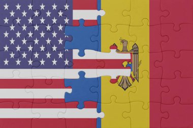 Moldova 'nın ulusal bayrağı ve Amerika Birleşik Devletleri' nin bulmacası. Makro. Kavram. 3d illüstrasyon