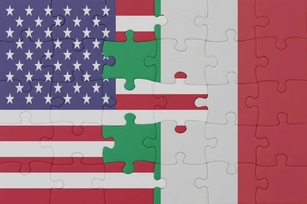 puzzle with the national flag of italy and united states of america. macro.concept. 3d illustration