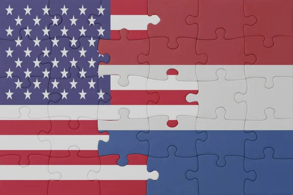 Pussel Med Den Nationella Flaggan Underlandet Och Amerikas Förenta Stater — Stockfoto