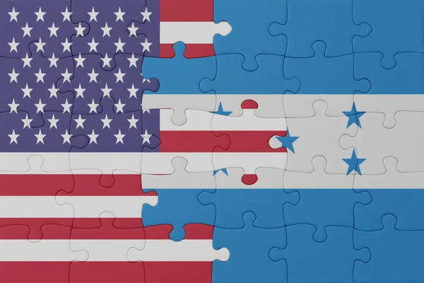 Puzzle Flagą Narodową Hondurasu Stanów Zjednoczonych Ameryki Makro Koncepcja Ilustracja — Zdjęcie stockowe