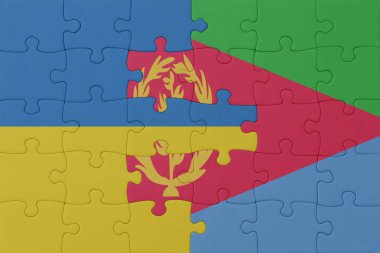 Ukrayna ve eritreanın ulusal bayrağıyla bulmaca. Makro. Kavram. 3d illüstrasyon
