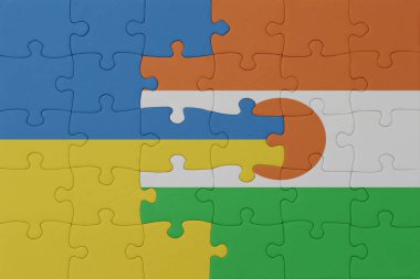 Ukrayna ve Nijer 'in ulusal bayrağıyla bulmaca. Makro. Kavram. 3d illüstrasyon