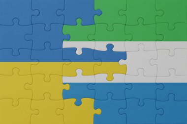 Ukrayna bayrağı ve Sierra Leone 'nin bulmacası. Makro. Kavram. 3d illüstrasyon