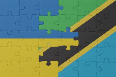 Ulusal Ukrayna ve Tanzanya bayrağı bulmacası. Makro. Kavram. 3d illüstrasyon