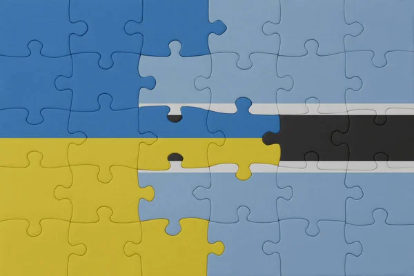 Puzzel Met Nationale Vlag Van Ukraine Botswana Macro Concept Illustratie — Stockfoto