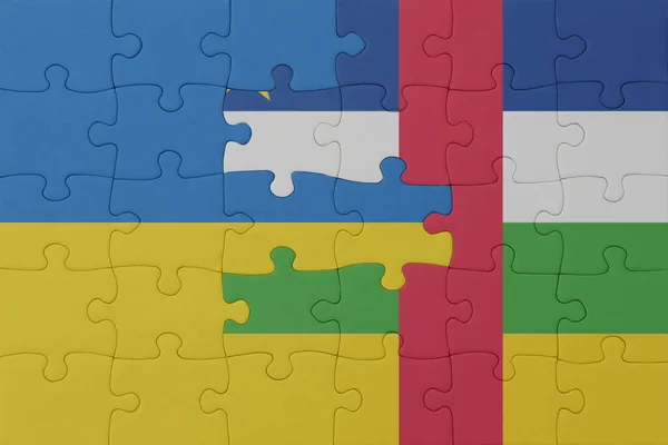 puzzle with the national flag of ukraine and central african republic . macro.concept. 3d illustration