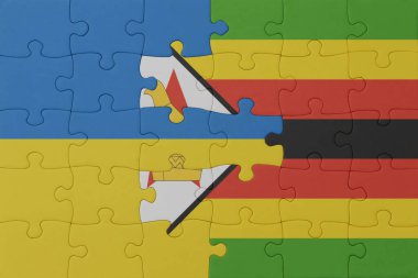 Ukrayna ve Zimbabwe 'nin ulusal bayrağıyla bulmaca. Makro. Kavram. 3d illüstrasyon