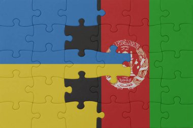 Ukrayna ve Afganistan 'ın ulusal bayrağıyla bulmaca. Makro. Kavram. 3d illüstrasyon