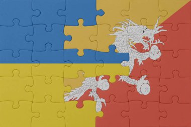 Ukrayna ve Butan 'ın ulusal bayrağıyla bulmaca. Makro. Kavram. 3d illüstrasyon