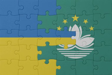Ukrayna ve Macau 'nun ulusal bayrağıyla bulmaca. Makro. Kavram. 3d illüstrasyon