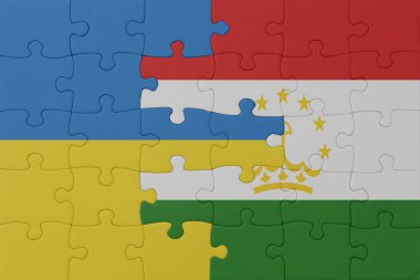 Ukrayna ve Tacikistan 'ın ulusal bayrağıyla bulmaca. Makro. Kavram. 3d illüstrasyon