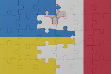 Ukrayna ve Malta ulusal bayrağıyla bulmaca. Makro. Kavram. 3d illüstrasyon