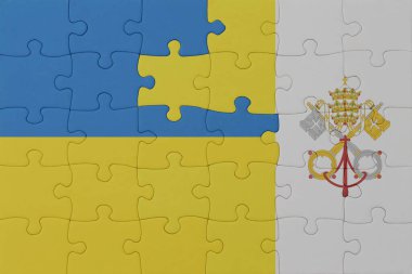 Ukrayna ve Vatikan bayrağının bulmacası. Makro. Kavram. 3d illüstrasyon