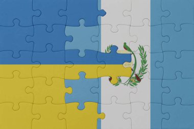Ukrayna ve Guatemala 'nın ulusal bayrağıyla bulmaca. Makro. Kavram. 3d illüstrasyon
