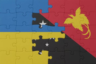 Ukrayna bayrağı ve Papua Yeni Gine 'nin bulmacası. Makro. Kavram. 3d illüstrasyon