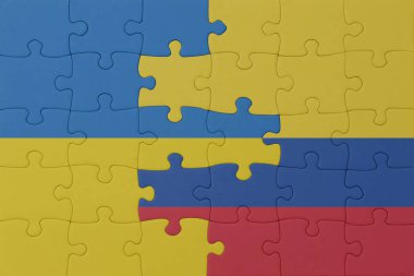 Ukrayna ve Kolombiya 'nın ulusal bayrağıyla bulmaca. Makro. Kavram. 3d illüstrasyon