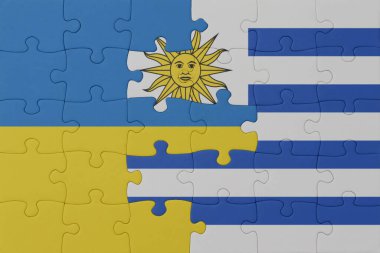 Ukrayna ve Uruguay 'ın ulusal bayrağıyla bulmaca. Makro. Kavram. 3d illüstrasyon